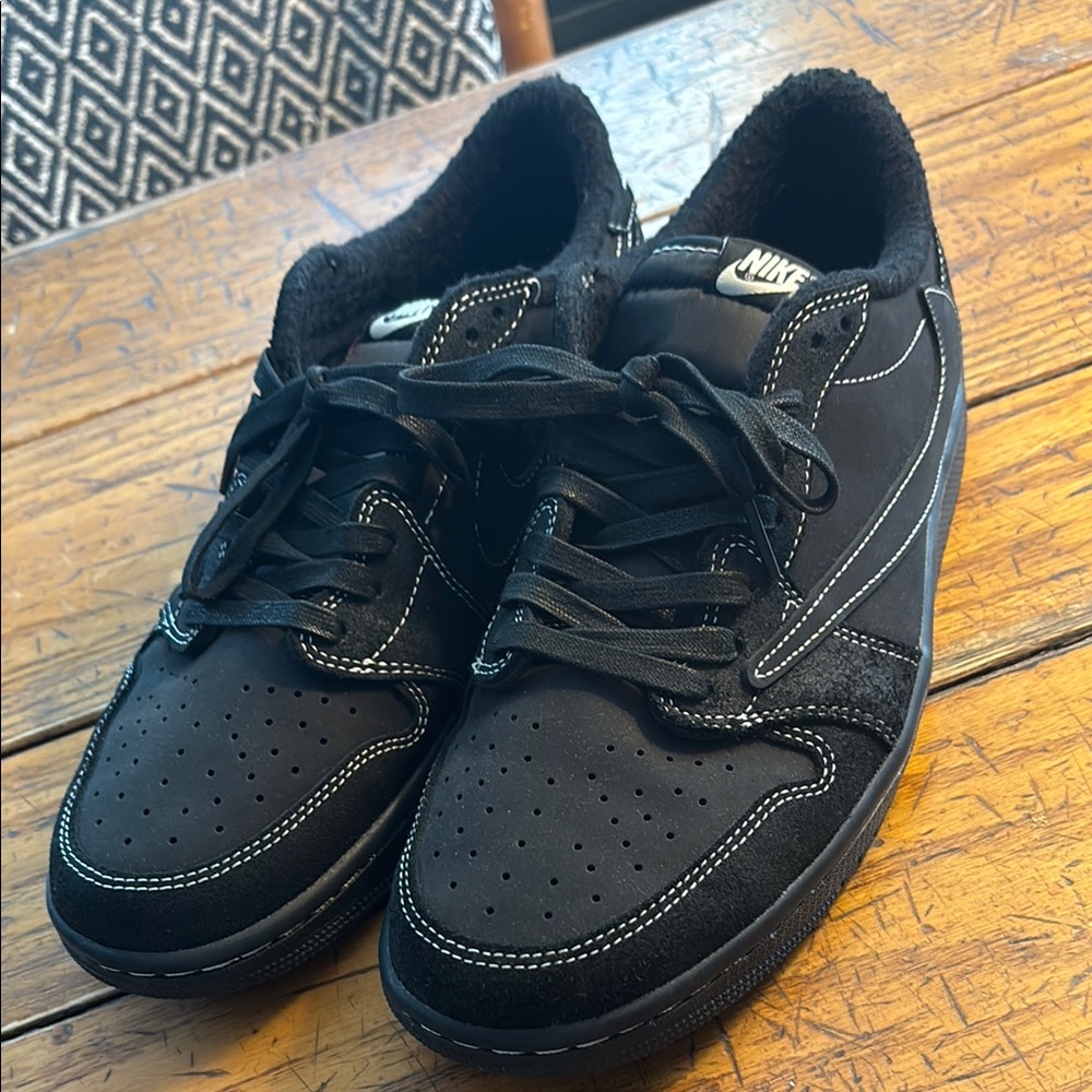 Air Jordan low, Travis Scott edition. Backwards swoosh